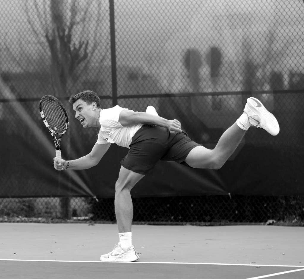 Sebastian stretching for a forehand